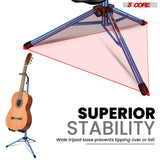 Stable electric bass and acoustic guitar stand with padded supports to securely hold multiple guitars